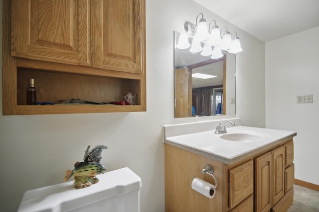 20128 554th St, Concord Twp, MN 55985 - half bathroom featuring vanity and toilet
