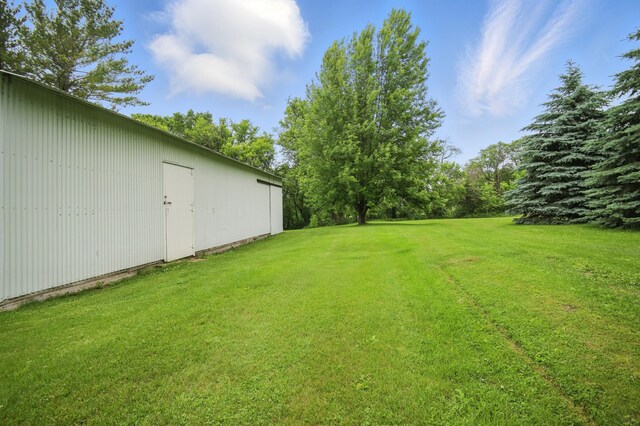 20128 554th St, Concord Twp, MN 55985 - view of green lawn with an outbuilding