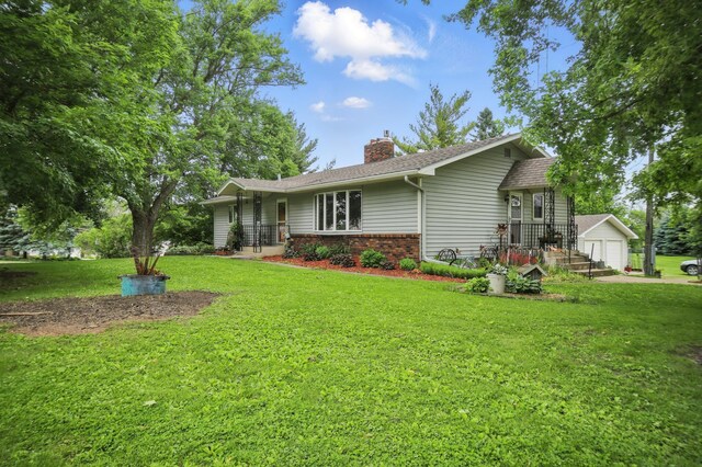 20128 554th St, Concord Twp, MN 55985 - view of front facade featuring a chimney, brick siding, a front lawn, and a garage