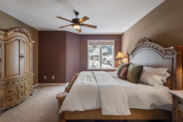 17365 Hanson Ct, Eden Prairie, MN 55347 - bedroom with light carpet, a ceiling fan, and a textured ceiling