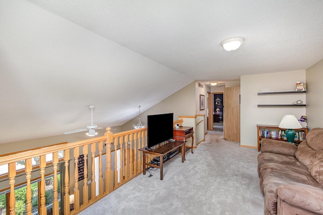 4426 Lakeshore Ter, Eagan, MN 55122 - living area with light carpet, a ceiling fan, lofted ceiling, and a textured ceiling