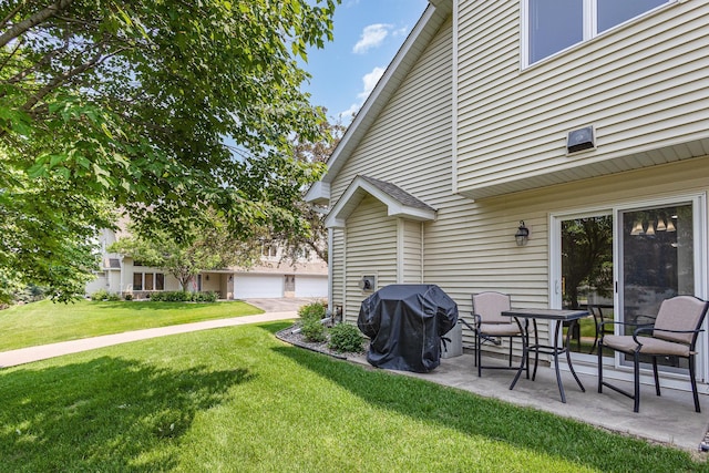4426 Lakeshore Ter, Eagan, MN 55122 - view of green lawn featuring a patio