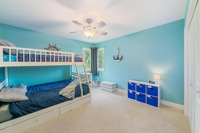 10460 Kismet Isle, Chisago Lake Twp, MN 55013 - bedroom featuring a closet, carpet flooring, and ceiling fan
