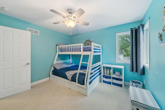 10460 Kismet Isle, Chisago Lake Twp, MN 55013 - carpeted bedroom featuring a ceiling fan and baseboards