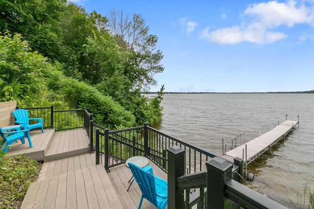 10460 Kismet Isle, Chisago Lake Twp, MN 55013 - deck featuring a water view and a boat dock