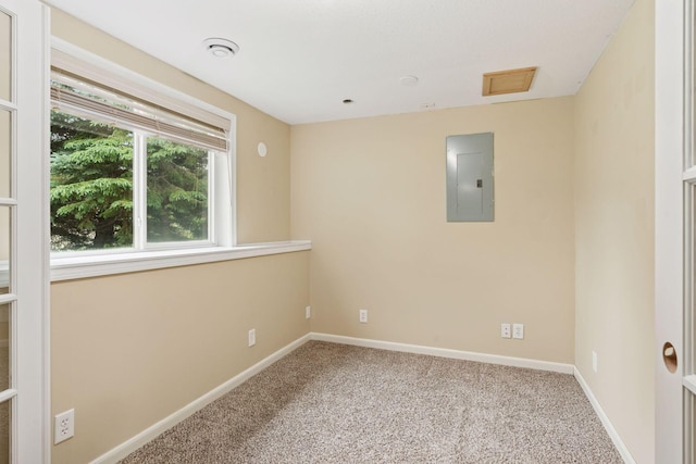 22087 Jasmine Way, Rogers, MN 55374 - carpeted spare room with electric panel and baseboards