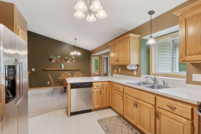 22087 Jasmine Way, Rogers, MN 55374 - kitchen featuring appliances with stainless steel finishes, a chandelier, vaulted ceiling, healthy amount of natural light, and light countertops