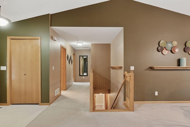 22087 Jasmine Way, Rogers, MN 55374 - hallway featuring an upstairs landing, vaulted ceiling, and carpet