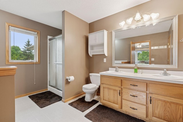 22087 Jasmine Way, Rogers, MN 55374 - full bathroom featuring double vanity and a stall shower