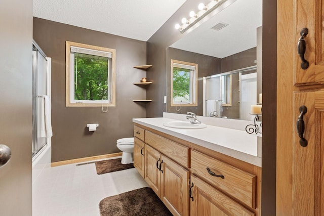 22087 Jasmine Way, Rogers, MN 55374 - bathroom with vanity and bath / shower combo with glass door