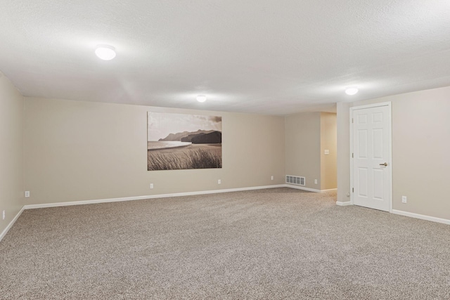 22087 Jasmine Way, Rogers, MN 55374 - unfurnished room featuring a textured ceiling and light carpet