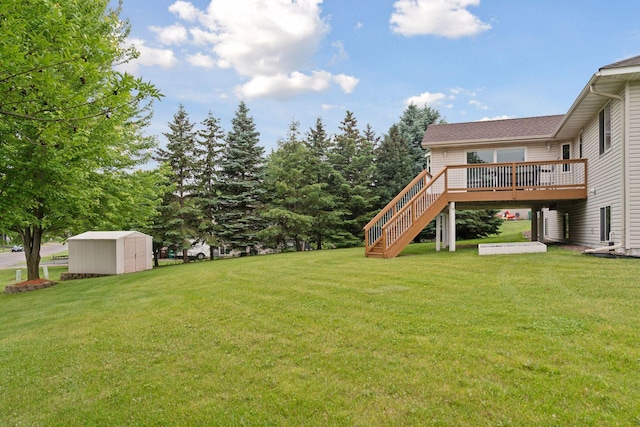 22087 Jasmine Way, Rogers, MN 55374 - view of grassy yard featuring a storage shed, stairway, and a wooden deck