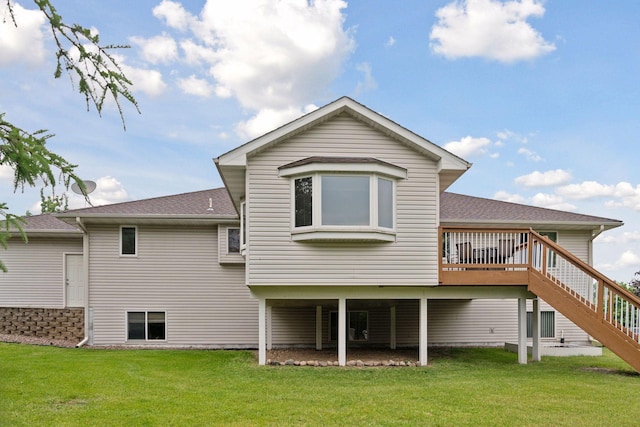 22087 Jasmine Way, Rogers, MN 55374 - rear view of house featuring stairs, a lawn, and roof with shingles