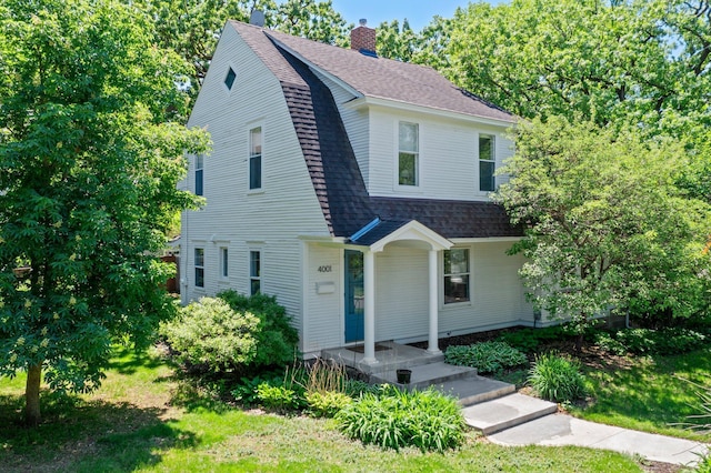 4001 Sheridan Ave S, Minneapolis, MN 55410 - dutch colonial with a chimney, a gambrel roof, and roof with shingles