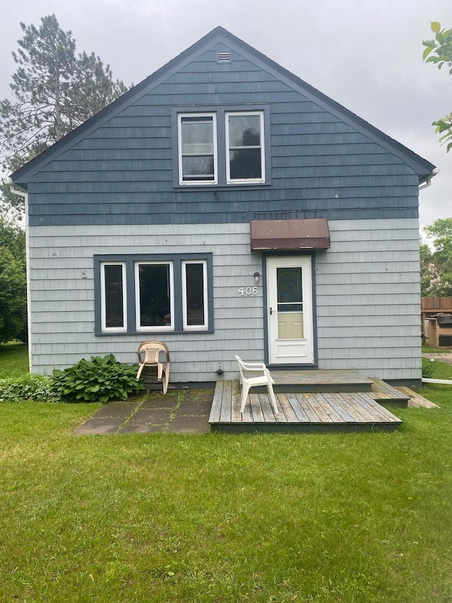406 N Rd, Cloquet, MN 55720 - back of house with a lawn