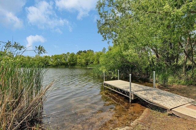 1301 20th Ave S, Sartell, MN 56377 - dock area with a boat ramp and a water view