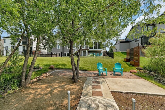 1301 20th Ave S, Sartell, MN 56377 - view of green lawn featuring stairs and a patio