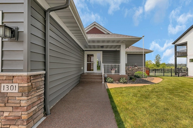 1301 20th Ave S, Sartell, MN 56377 - doorway to property featuring a shingled roof