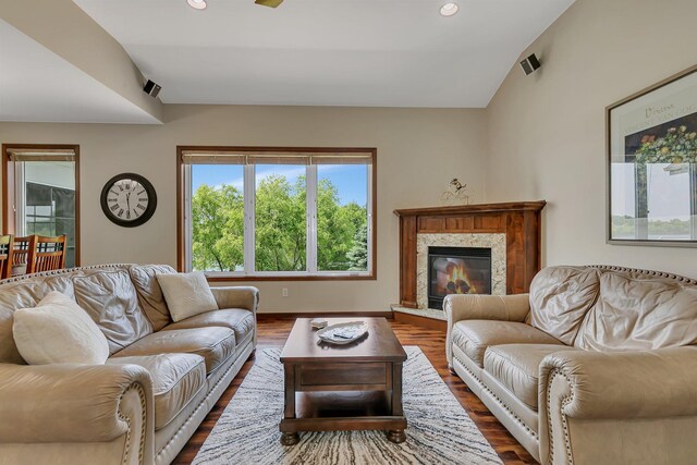 1301 20th Ave S, Sartell, MN 56377 - living area with dark wood-style floors, recessed lighting, and a high end fireplace