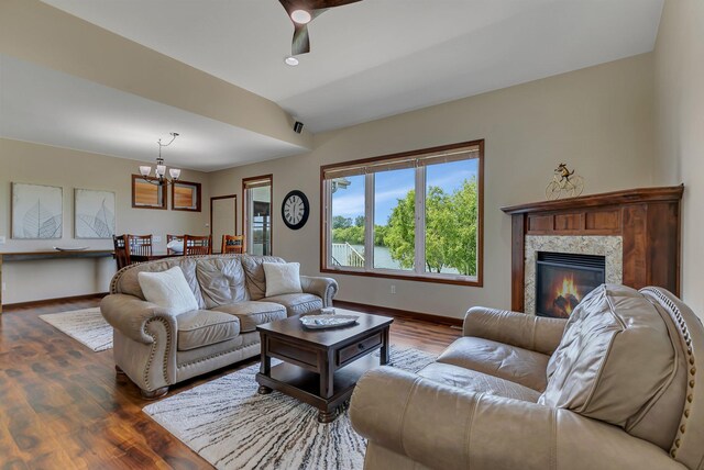 1301 20th Ave S, Sartell, MN 56377 - living room with wood finished floors, a chandelier, and a premium fireplace