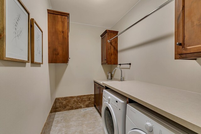 1301 20th Ave S, Sartell, MN 56377 - washroom featuring washing machine and clothes dryer and cabinet space