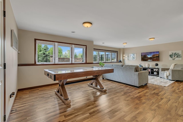 1301 20th Ave S, Sartell, MN 56377 - recreation room with light wood finished floors and baseboards