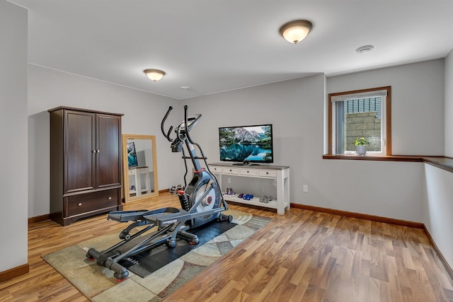 1301 20th Ave S, Sartell, MN 56377 - workout room with baseboards and light wood-style flooring