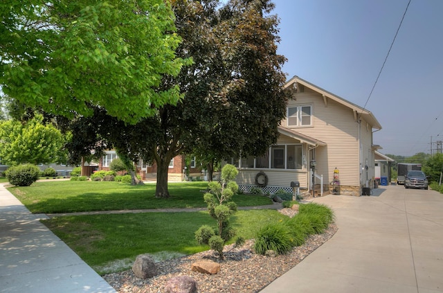 544 7th St, Red Wing, MN 55066 - obstructed view of property with a front yard and driveway