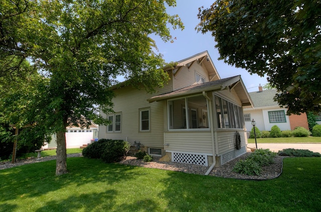 544 7th St, Red Wing, MN 55066 - view of side of property featuring a yard and a sunroom