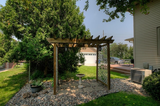 544 7th St, Red Wing, MN 55066 - view of grassy yard with a deck, a pergola, and a garage