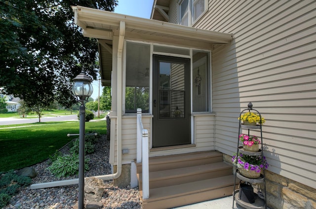 544 7th St, Red Wing, MN 55066 - doorway to property featuring a lawn