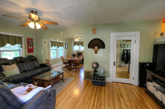 544 7th St, Red Wing, MN 55066 - living area featuring ceiling fan, light wood-type flooring, and a textured ceiling