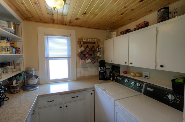 544 7th St, Red Wing, MN 55066 - laundry room featuring washing machine and dryer, cabinet space, and wooden ceiling