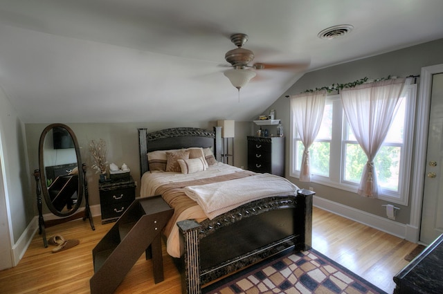 544 7th St, Red Wing, MN 55066 - bedroom featuring lofted ceiling, light wood-style flooring, and ceiling fan