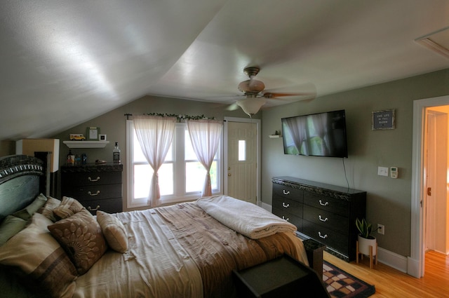 544 7th St, Red Wing, MN 55066 - bedroom featuring light wood-type flooring, lofted ceiling, and a ceiling fan