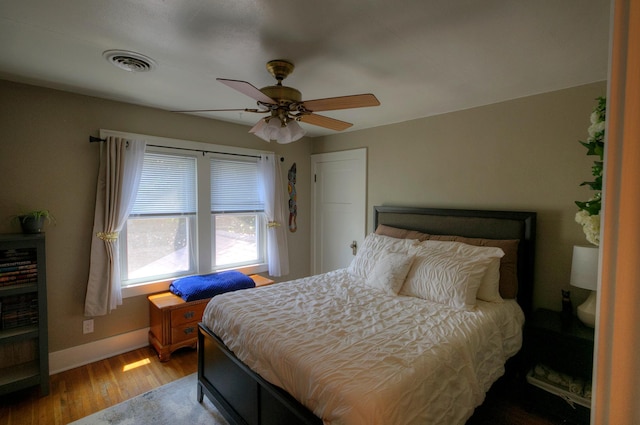 544 7th St, Red Wing, MN 55066 - bedroom featuring wood finished floors and a ceiling fan