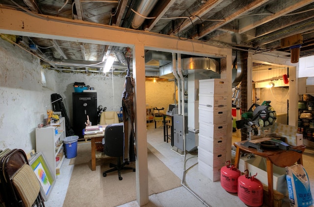 544 7th St, Red Wing, MN 55066 - unfinished below grade area featuring a desk and heating unit