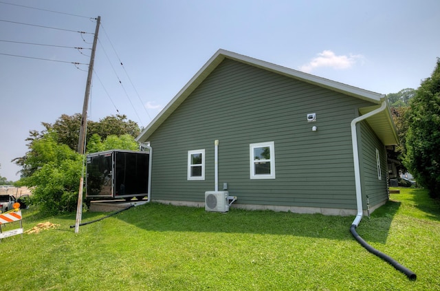 544 7th St, Red Wing, MN 55066 - view of side of property featuring a lawn and a sunroom