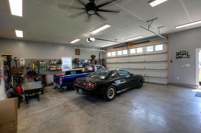 544 7th St, Red Wing, MN 55066 - garage with a garage door opener and a ceiling fan