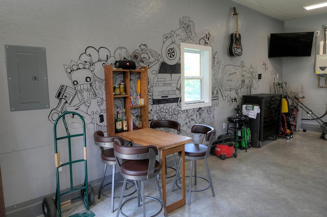 544 7th St, Red Wing, MN 55066 - dining space with electric panel and concrete floors