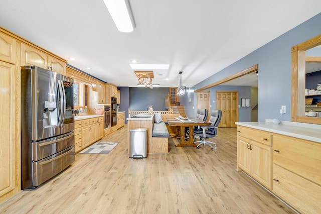 108 1st St, Kenyon, MN 55946 - kitchen featuring stainless steel fridge, light brown cabinets, light wood-type flooring, light countertops, and recessed lighting
