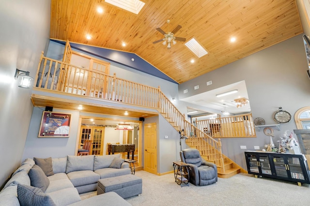 108 1st St, Kenyon, MN 55946 - living room with stairs, a skylight, carpet, high vaulted ceiling, and wood ceiling