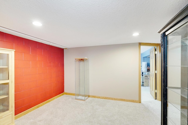 108 1st St, Kenyon, MN 55946 - spare room with carpet, recessed lighting, baseboards, and a textured ceiling