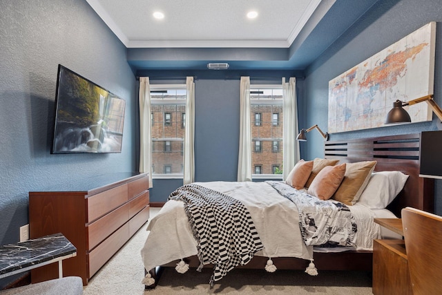 308 18th St Unit 202, Minneapolis, MN 55404 - bedroom with multiple windows, crown molding, carpet floors, a textured wall, and recessed lighting