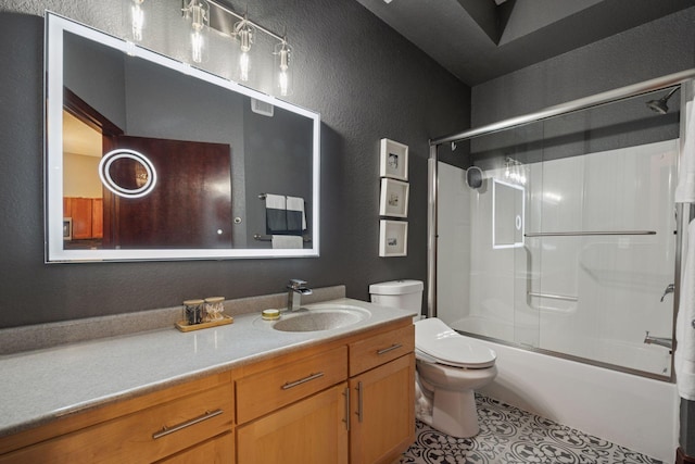 308 18th St Unit 202, Minneapolis, MN 55404 - full bathroom with a textured wall, vanity, shower / bath combination with glass door, and tile patterned flooring