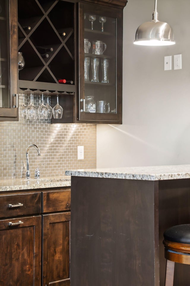 3365 Osgood Way N, Baytown Twp, MN 55082 - indoor wet bar with backsplash and decorative light fixtures