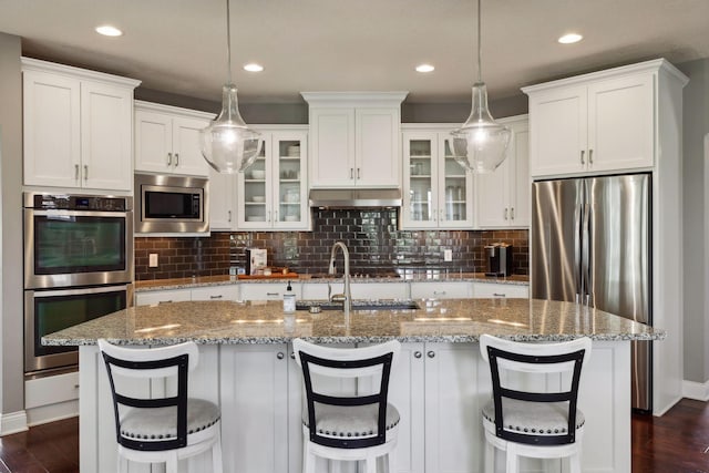3365 Osgood Way N, Baytown Twp, MN 55082 - kitchen with appliances with stainless steel finishes, dark wood-type flooring, glass insert cabinets, and recessed lighting