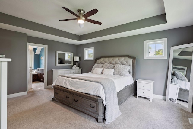 3365 Osgood Way N, Baytown Twp, MN 55082 - bedroom featuring light carpet, multiple windows, and a tray ceiling