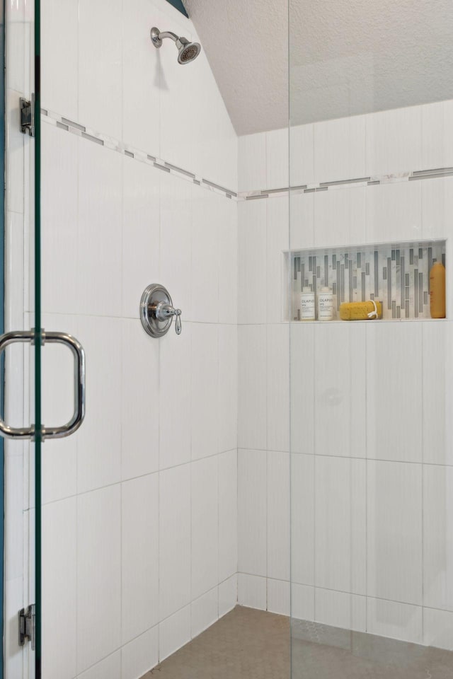3365 Osgood Way N, Baytown Twp, MN 55082 - bathroom featuring a shower stall and a textured ceiling