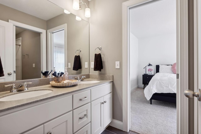 3365 Osgood Way N, Baytown Twp, MN 55082 - ensuite bathroom featuring double vanity and baseboards